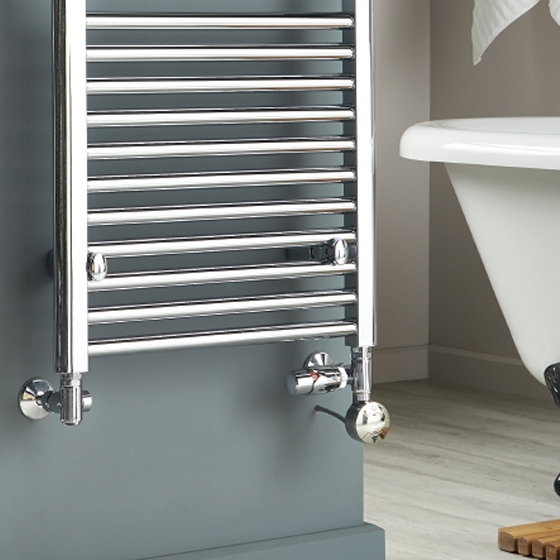 Black heated towel rail in a bathroom